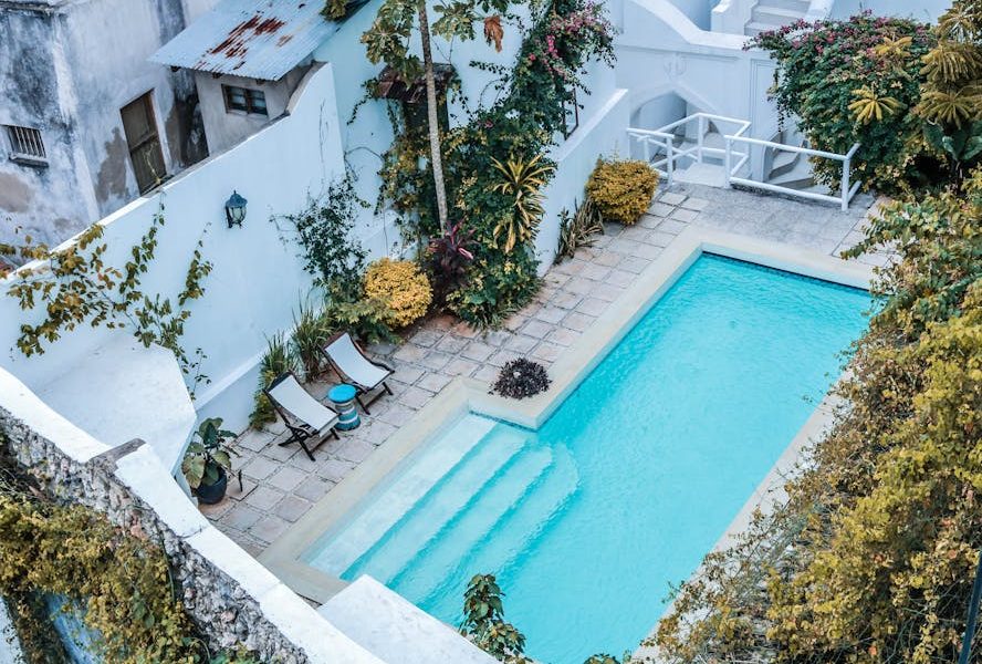 Cloudy Pool Woes? How Robotic Cleaners Restore Your Backyard Oasis